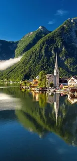 A peaceful village by a mountain lake with serene reflections and lush greenery.