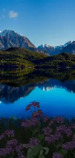 Scenic view of mountain and lake reflection under blue sky.