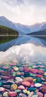 Vibrant mountain lake with colorful stones and scenic reflections.