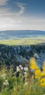 Serene mountain landscape with green valleys and a clear blue sky.