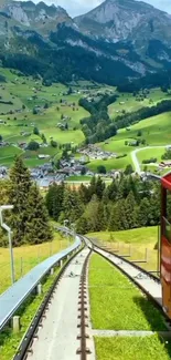 Red train on mountain railway with scenic green hills.