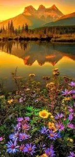 Mountain reflection with colorful wildflowers at sunset.