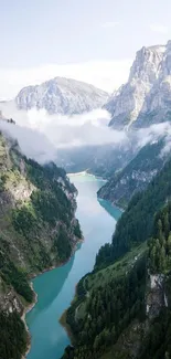 Aerial view of a turquoise river flowing through lush green mountains.