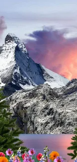 Scenic view of snowy mountains at sunset with vibrant skies and lake.