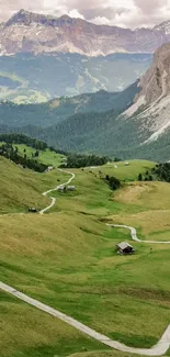 Winding road through lush green mountain valley.