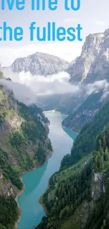 Scenic mountain valley with river and lush greenery wallpaper.