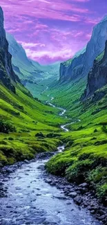 Scenic mountain valley with river and vibrant sunset.