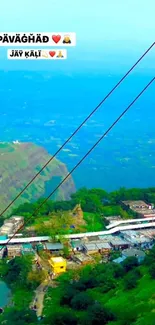 A vibrant mountain landscape with lush greenery and blue skies.