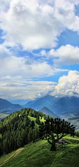 Scenic mountain view with green hills and a vibrant cloudy sky.
