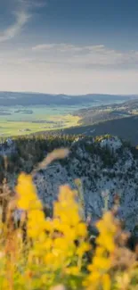 Scenic mountain view with lush greenery and clear blue sky.