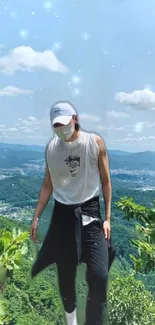 Person hiking with mountain and sky background.