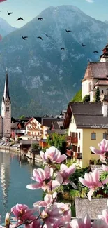 Mountain village with pink flowers and scenic view.