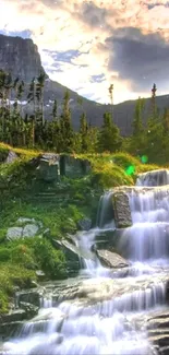 Majestic mountain landscape with waterfall at sunrise.