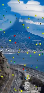 Mountain with blue sky and colorful confetti backdrop.