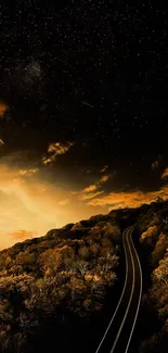 A road leading into the starry night sky with golden hues.