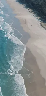 Aerial ocean view with beach and waves wallpaper.