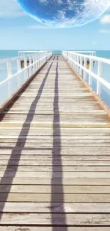 Wooden pier stretching into blue ocean with a clear sky overhead.