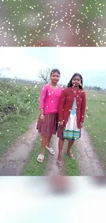 Two women on a scenic path with sparkles and nature background.