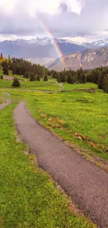 Mountain path with rainbow and green landscape wallpaper