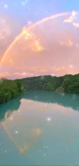 Serene river with rainbow and sunset sky.