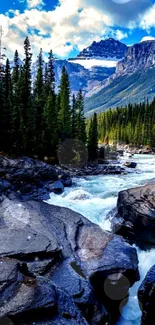 Scenic view of river valley with pine trees and distant mountains at sunset.