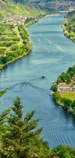 Aerial view of a scenic river valley surrounded by lush greenery.