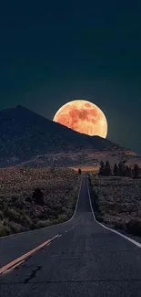 A scenic road leads to a full moon behind a dark hill at night.