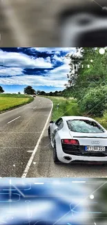 Stunning sports car on a scenic countryside road for mobile wallpaper.