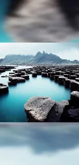 Stunning rocky landscape with tranquil blue waters and cloudy sky.