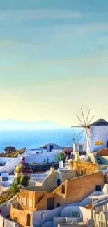 Santorini scenic wallpaper featuring traditional windmill and stunning view.