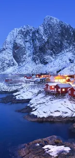 Snowy coastal village under twilight sky, with mountains.