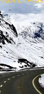 Snowy mountain road in winter landscape.