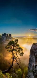 Breathtaking sunrise over a mountain landscape with a lone tree and vibrant colors.