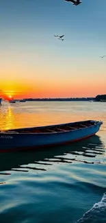 Peaceful sunset with boats on the water.