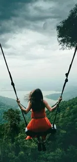 Woman in red dress swinging over lush green landscape.