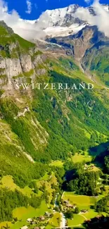 Majestic Swiss mountains with lush green valley.