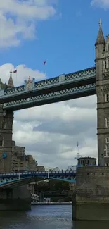 Tower Bridge under cloudy sky in London.