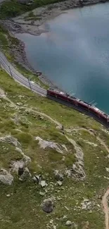 Scenic train journey beside a blue lake