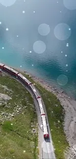 A scenic train traveling by a turquoise blue lake.