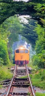 Yellow train through lush green tunnel, scenic view.