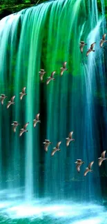 Serene waterfall with birds flying in forest.