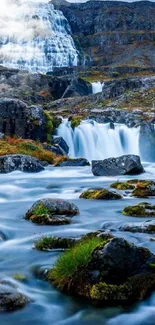 Scenic Icelandic waterfall with flowing water and rocky terrain.