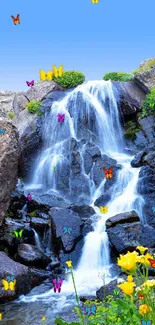 Captivating waterfall with clear blue sky, lush greenery, and vibrant flowers.