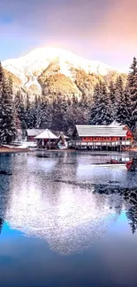 Winter lake and mountain reflection with cozy cabins.