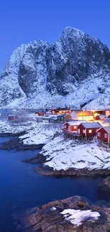 Snowy mountain village with blue sky.