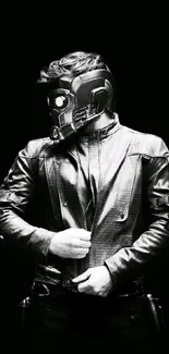 Masked sci-fi hero in leather jacket on black background.