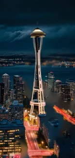 Seattle skyline featuring Space Needle at night with city lights.