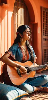 Woman in bohemian style playing guitar in a terracotta setting.