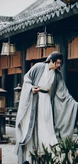 Man in traditional attire in an ancient courtyard.