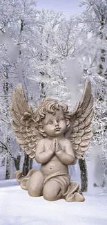 Angel statue in a snowy forest, serene and calming.